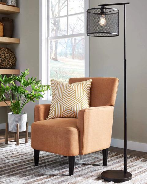 Living room setting with modern industrial metal floor lamp with bronze finish, 61 inch tall, metal mesh drum shade
