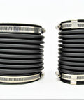 Pair of black rubber marine exhaust bellows with stainless steel hose clamps; ribbed, shown side-by-side.