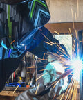 Welder using Copper MIG Contact Tips 0.030 Inch Pack Of 4 For Tweco Binzel Clarke Guns Pro Grade Machined for precise welds.