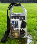 Clear Stadium Approved See Through Bag Pouch Water Resistant Crossbody Dry Bag displaying items inside, outdoors in rain.