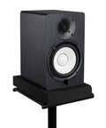 Studio Monitor Isolation Pads For 5 Inch Monitors, 2 Pack, securing black speaker on stand, high density acoustic foam reducing vibration.
