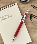 Retractable Snoopy Pen With Red Backdrop A Fun Peanuts Gift For Back To School Work Or Birthday Ideal Desk Accessory Cute Office Supply For Any Snoopy Fan Totally Great Gift For Teachers Students Or Coworkers And Snoopy Lovers Alike on notebook with paperclips
