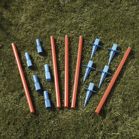 Lightweight Dog Agility Slalom Kit With Carry Bag For Backyard Training And Fun, stakes and poles laid out on grass