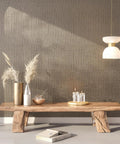 Taupe Metallic Grasscloth Peel And Stick Wallpaper Roll Featuring Faux Woven Texture With Subtle Shimmer on a stylish wall.