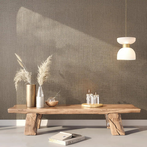 Taupe Metallic Grasscloth Peel And Stick Wallpaper Roll Featuring Faux Woven Texture With Subtle Shimmer on a stylish wall.