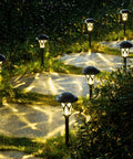 6 Pack Solar Pathway Lights Outdoor Set illuminating a garden walkway at night, showcasing durable metal, glass, and ABS build
