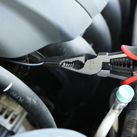 9 Inch Needle Nose Pliers With High Leverage Heavy Duty 4 In 1 Multifunction Long Nose Pliers gripping wire in engine bay
