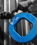 Pro Grade Blued Steel Fish Tape, 240 Feet Long, One Eighth Inch, 1600 Lb Tensile Strength, Rust Resistant, Laser Etched Measurements, Ultra Durable Tuff Grip Pro Case for Hard Wire Pulling Jobs held by worker