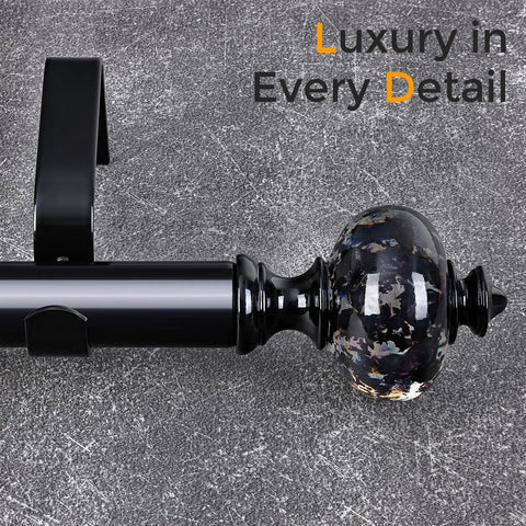 Close-up of black curtain rod with crystal finials, showcasing ultra modern luxury curtain hardware, rock solid iron construction.