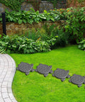 Turtle Shaped Concrete Stepping Stone Molds Reusable Cement Molds For DIY Patio Path Lawn Garden Landscaping Crafting Accessories For Pavement Walkway Outdoor Decor installed on a garden path.