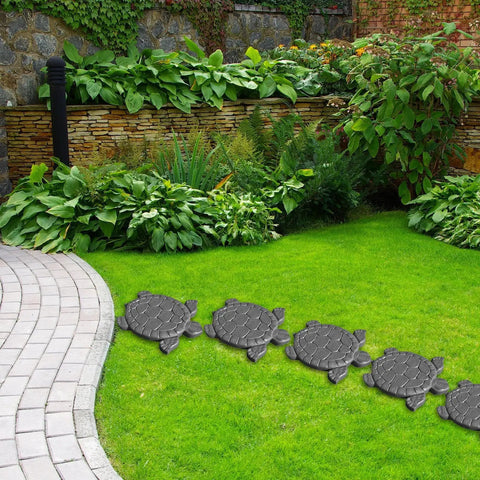 Turtle Shaped Concrete Stepping Stone Molds Reusable Cement Molds For DIY Patio Path Lawn Garden Landscaping Crafting Accessories For Pavement Walkway Outdoor Decor installed on a garden path.