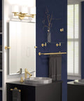 Latitude II 20-Inch Glass Bathroom Shelf Wall Mounted In Brushed Brass displayed above a sink in modern bathroom.