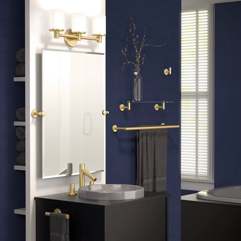 Latitude II 20-Inch Glass Bathroom Shelf Wall Mounted In Brushed Brass displayed above a sink in modern bathroom.