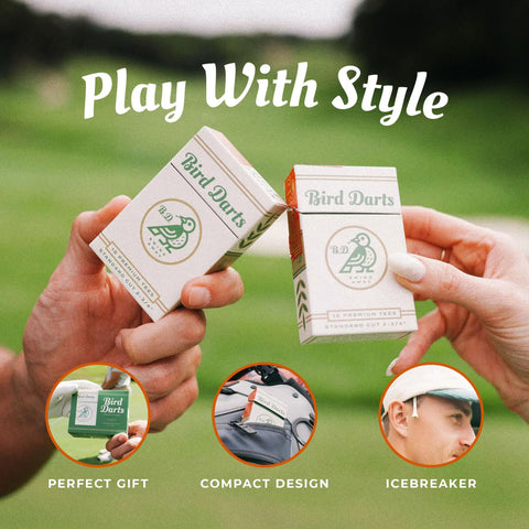 Two hands holding Premium Bamboo Golf Tees In Cigarette Style Pack Two And Three Quarter Inch Tees 18 Pack in green packaging