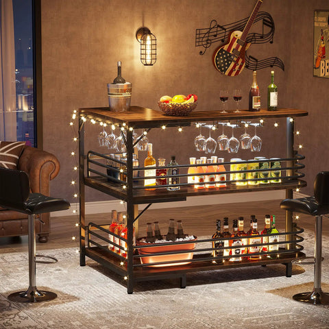 L Shaped Home Bar Unit With 3 Tier Storage Shelves And Wine Glass Holder For Kitchen Or Living Room Rustic Brown And Matte Black Industrial Corner Bar Cabinet With Pub Vibe, illuminated with string lights, showcasing bottles and glasses.
