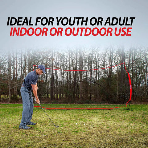 Man practicing golf in front of 20x10 Ft Sports Net Backstop With 200 Sq Ft Coverage Multi Sport Barrier Netting for all weather practice