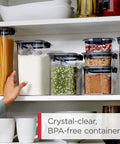 Clear 32oz Cereal Storage Container With Airtight Seal, Shatterproof Tritan, BPA Free And Dishwasher Safe on pantry shelf.