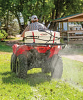 ATV Sprayer 2.4 GPM High Flo Pump, 12V Self Priming, 60 PSI, 15 Gallon Tank mounted on ATV in use on grass field
