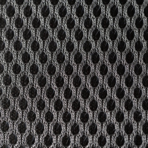 Close-up of durable 1680D poly mesh fabric from Heavy Duty Built To Last 1680 Denier Poly Carpenter Tool Belt With Gel Padded Suspenders 17 Inside Pockets And 7 Outside Pockets Drill Holder Steel Hammer Loop Tape Measure Holder Vinyl Reinforced Pouches Fits 29 To 46 Inches Waists.