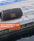 Rugged Outdoor Ready Portable Bluetooth Speaker With Sick Bass And Massive Sound, IP67 Waterproof, 15 Hours Playtime, Built In Power Bank, PartyBoost For Multi Speaker Pairing, Made For Adventure on poolside