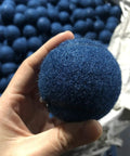 Close-up of blue felt Heavy Duty Floor Protector Tennis Ball 2.36 inch for classroom furniture, precut and durable.