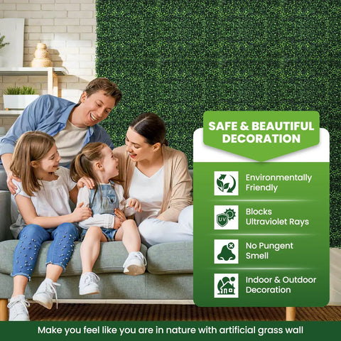 Family sitting on sofa with Boxwood Hedge Panel Pack 24 Count 20 By 20 Inches Artificial Grass Wall Backdrop in living room.