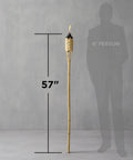 Easy Pour 12 Pack Bamboo Torch Set With Classic Weave Brown Finish Outdoor Lawn Patio Garden Lighting Weather Resistant 57 Inch Tall Decorative Torches Renewable Bamboo Spill Free Fuel Canisters standing next to a silhouette for size comparison.