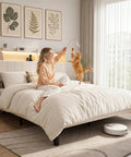 Queen Size Upholstered Bed Frame With Built In Charging Headboard And Hidden Storage Shelves Beige Platform Base featuring a woman and cat playing.