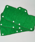 Green Velvet Terry Sweatband For Hard Hats, Washable Snap On Liner, 3 Pack shown flat with white snap buttons, ultra soft material