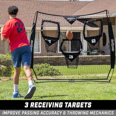 Man practicing with Six By Six Foot Football Throwing Net For QB Training And Passing Accuracy With Three Target Pockets Simulating Prime Receiving Areas.