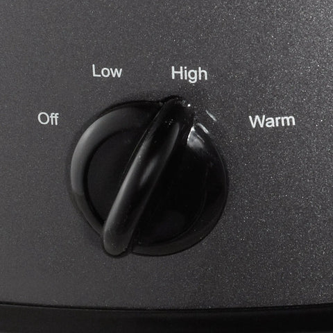 Close-up of control dial showing Off, Low, High, and Warm settings on Huge 7 Quart Manual Slow Cooker Serving As A Real Weeknight Hero With Removable Stoneware Pot, High And Low Settings Plus Auto Warm Mode, No Fuss Dishwasher Safe Cleanup, Charcoal Finish.