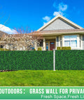 Artificial Boxwood Roll Panels 48x120 Inches Cover 40 Sq Ft UV Resistant Faux Ivy Leaves Privacy Fence in front of house
