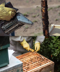 All In One Beekeeping Starter Kit With Bee Smoker And 16 Handy Tools For Beekeepers in use at a hive with bees.