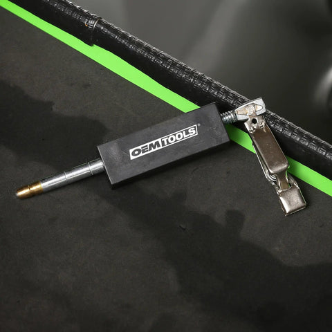 Adjustable Ignition Spark Tester for Small and Large Engines Spark Plug Tester and Spark Load Diagnostic Tool Easy To Use For DIY Mechanics And Pros At Home on a workbench