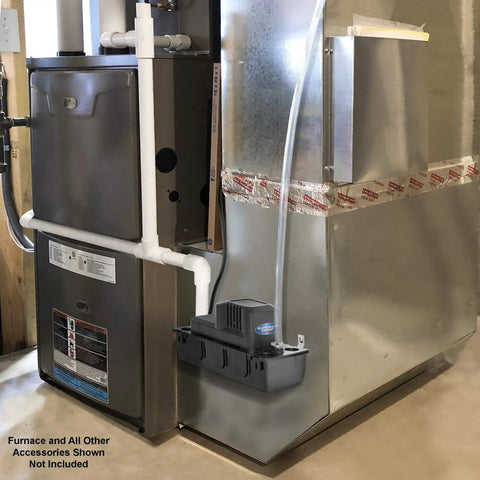 Automatic Condensate Pump With Safety Switch For HVAC And Dehumidifier installed next to furnace, visible tubing and tank