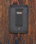 Molded Ballistic Alarm Case Nylon Tactical Pouch for CDCR and Corrections Officers, front view on wooden surface.