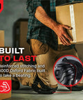Person kneeling with boxes wearing Heavy Duty Gel Knee Pads For Work with reinforced stitching and durable fabric.