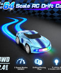 One Sixty Fourth Scale Drift RC Car 4WD With LED Lights And Speed Switch, blue desk racer with glowing trails in motion