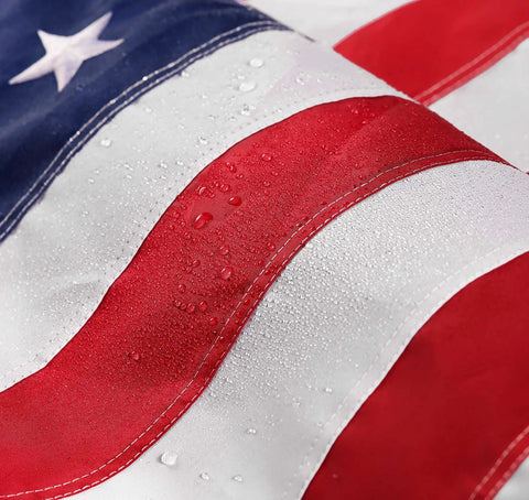 Close-up of Durable Outdoor US Flag 4x6 Ft Built For Weather Heavy Duty 210D Nylon Embroidered Stars Sewn Stripes Brass Grommets UV Protected