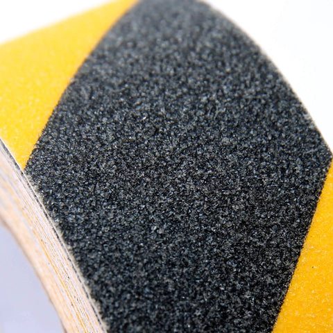 Close-up of Heavy Duty Anti Slip Grip Tape 6 Inch By 30 Ft Black And Yellow Striped 80 Grit Aluminum Oxide Industrial Grade