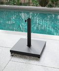 Outdoor Umbrella Base 42Lbs With Stainless Steel Tube next to pool, heavy duty cement-filled square metal stand