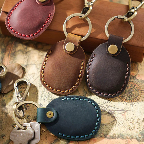 Premium Handmade Genuine Leather AirTag Holder And Keychain With Heavy Duty Rings Protective Case Compatible With Apple AirTags First And Second Gen Straight Up Solid Brown, featuring various colors.