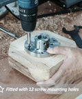 No Nonsense Heavy Duty 4 Inch Steel Wood Lathe Faceplate With 1x8TPI Spindle, drilling into wooden block with 12 screw holes.