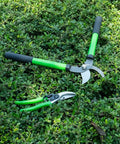 Workhorse Garden Pruning Shears With SK5 Steel Blades And Ergonomic Non Slip Handle on green shrub background