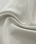 Close-up of light gray blackout fabric for 36 Inch Length Curtain Tiers For Loft And Kitchen Blackout Light Gray 2 Panels Each 42 Inch Wide 3 Inch Rod Pocket Universal Fit Ideal For Bathroom Nursery Cafe Basement Windows.