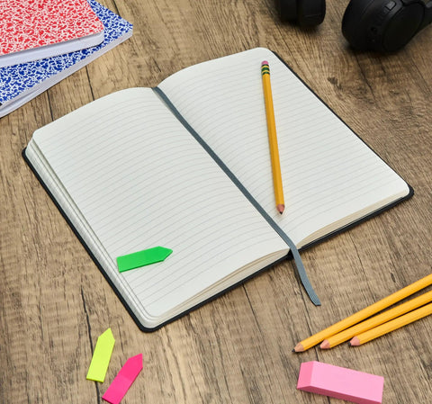 Logistics Nerds Journal For Supply Chain Ops Hardcover With 240 Lined Pages Elastic Closure Ribbon Bookmark Expanding Inner Pocket And Pen Holder Black open on desk