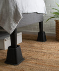 Bed on 6 inch bed riser set of 4 with wheel grooves for stable lifts and easy under bed storage in dorm or bedroom durable plastic
