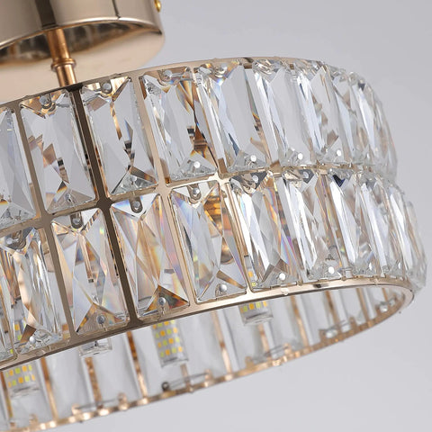 Close-up of 68 K5 crystals in a lit rose gold semi flush mount crystal ceiling light with modern chandelier details.
