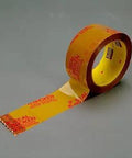 Tan Box Sealing Tape 48mm By 914m, Heavy Duty Packing Tape Built For Ecommerce And Parcel Shipments With Red Warning For Seal Integrity