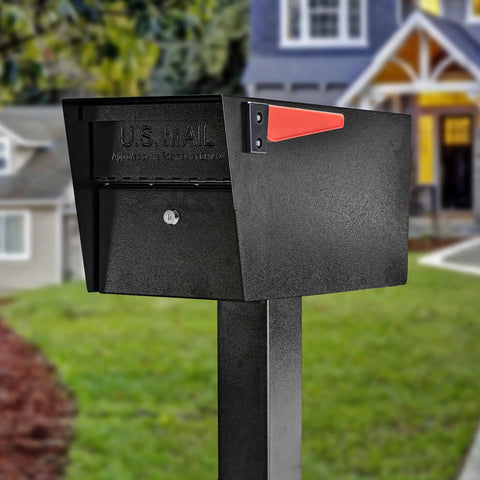Heavy Duty Curbside Locking Mailbox With House Numbers, Pull Out Mail Tray, Mounting Plate, And USPS Approved Security For Residential Use Black Powder Coated Steel Built To Beat Thieves With Beefed Up Vandal Resistant Design, against a residential background.